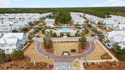 an aerial view of a resort at Arcade Bar Prominence Resort Pool and Gym Access Close to Beach Sea Happy in Watersound Beach