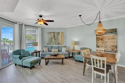 a living room with a couch and a table at Dunes of Seagrove 106A in Santa Rosa Beach