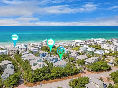 an aerial view of a resort with hot air balloons at Seagrove Retreat - Steps to Beach, Pool, and Seaside in Santa Rosa Beach