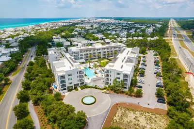 an aerial view of a resort with the ocean at The Pointe at Rosemary Beach 332 in Rosemary Beach