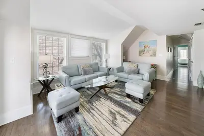 a living room with a couch and a table at Rosemary Beach 5 Main St 1F in Rosemary Beach