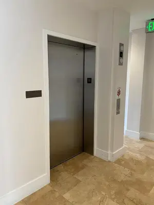 a door to a elevator in a building at Rosemary Beach 5 Main St 1F in Rosemary Beach