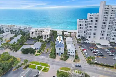 an aerial view of a building in front of the ocean at Palazzo 30A in Santa Rosa Beach