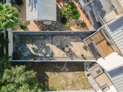 an overhead view of a swimming pool in a yard at Palm Sounds in Inlet Beach