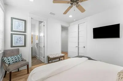 a bedroom with a bed and a ceiling fan at Available for Season! Hi Beautiful Ciao Bella at Seacrest in Inlet Beach