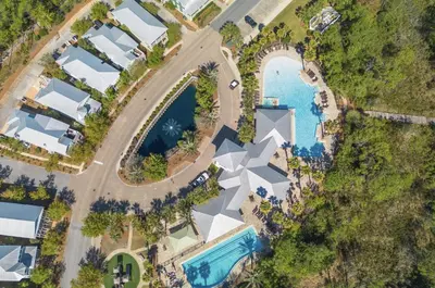 an aerial view of a house with a swimming pool at Available for Season! After Dune Delight at Nature Walk in Santa Rosa Beach