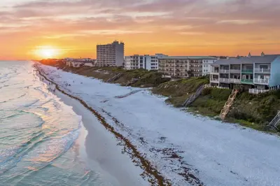 an aerial view of the beach at sunset at Available for Season! One Life One Love Gulf-Front Townhome in Seagrove Beach