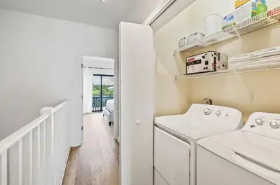 a laundry room with a washer and dryer at Available for Season! One Life One Love Gulf-Front Townhome in Seagrove Beach