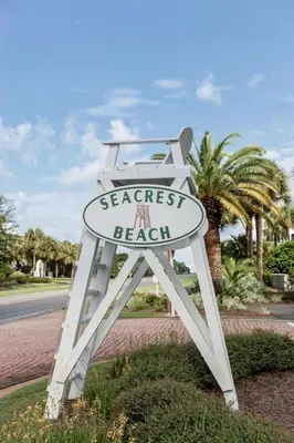 a sign for a beach on the side of a road at You've Hit The Vacay Jackpot with This Sure Winner! in Rosemary Beach