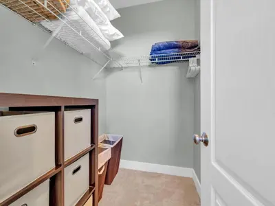 a room with a closet with a ceiling at Penthouse Paradise Condo at Seacrest in Rosemary Beach