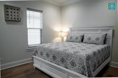 a bedroom with a bed and a window at R3 at Inlet Beach with Pool Access and EV Connector - Walk to Beach in Inlet Beach
