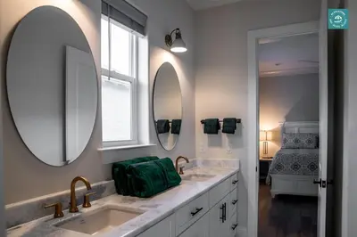 a bathroom with two sinks and two mirrors at R3 at Inlet Beach with Pool Access and EV Connector - Walk to Beach in Inlet Beach