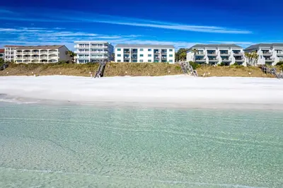 a view of condos from the beach at Gulf Front, Seagrove Beach, Sleeps 6, 1st floor, private beach access!! in Seagrove Beach