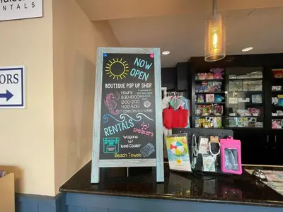 a sign on the counter of a store at Majestic Beach Towers #2-1203 in Panama City Beach