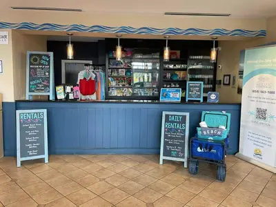 a restaurant with a blue counter with signs in front of it at Majestic Beach Towers #2-1203 in Panama City Beach