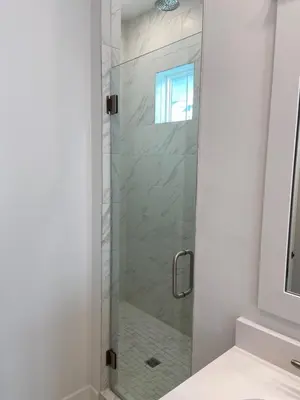 a shower with a glass door in a bathroom at BIG EASY on 30A in Watersound Beach