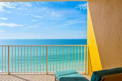 a balcony with a view of the ocean at Treasure Island #1102 in Panama City Beach