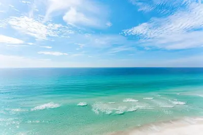 an overhead view of a beach with the ocean at Treasure Island #1102 in Panama City Beach