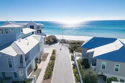 an aerial view of the beach and buildings at Southern Breeze in Inlet Beach