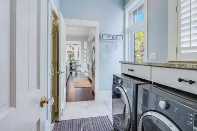 a laundry room with a washer and dryer at Southern Breeze in Inlet Beach