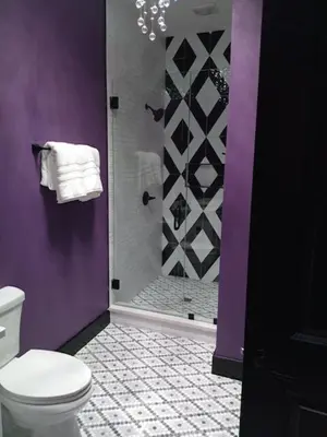 a purple bathroom with a toilet and a shower at Vibrant NewOrleans style retreat in Panama City Beach