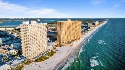 an aerial view of a beach with buildings and the ocean at 1004 Seychelles in Panama City Beach