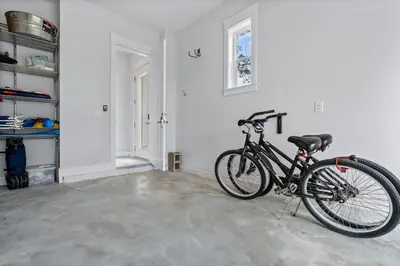 a bike parked in a room with a wall at The Anchorage in Inlet Beach