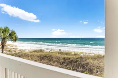a view of the beach from a balcony at Ramsgate Harbour #16 by 30A Escapes in Panama City Beach