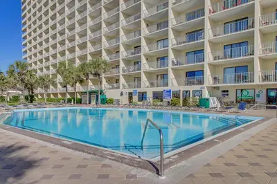 a large swimming pool in front of a hotel at The Summit 1019-Toes in the Sand in Panama City Beach