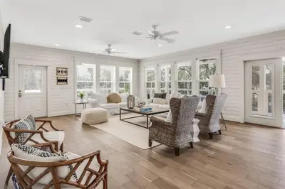 a living room with chairs and a couch at Beach Retreat Gulf View Private Beach in Seacrest