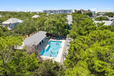 an overhead view of a pool at a resort at Driftwood Place Renovations Underway Bikes in Seacrest