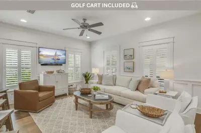 a white living room with a couch and a table at Southern Tides 4BR 4 5BA Sleeps 14 Golf Cart in Seacrest