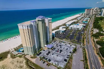 an aerial view of a beach with tall buildings and the ocean at Boardwalk 501 in Panama City Beach