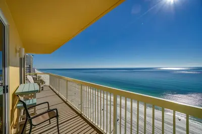 a balcony with a view of the ocean at Calypso 1401E in Panama City Beach