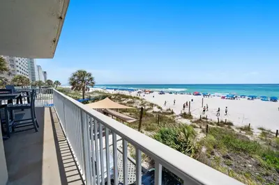 a balcony with a view of the beach at Grandview East 101 in Panama City Beach