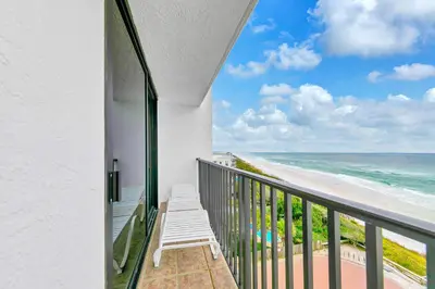 a balcony with a view of the beach at One Seagrove Place 702 Gulf-front unit sleeps 6 in Santa Rosa Beach