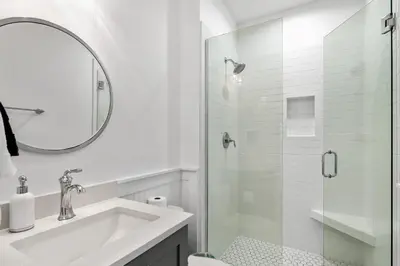 a white bathroom with a sink and a shower at Caspian Blue Paradise 30A Luxe Retreat in Seacrest