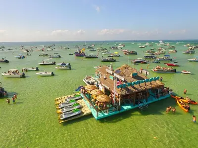 an aerial view of a pier with boats in the water at Destin Towers 1E in Panama City