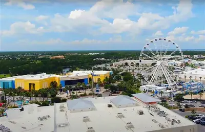 an aerial view of a amusement park with a ferris wheel at Lah De Dah by Emerald Coast Retreats in Panama City Beach