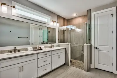 a bathroom with two sinks and a shower at R3 at Lake Powell near Panama City Beach and 30A in Panama City Beach
