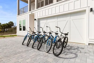 a group of bikes parked in front of a building at The Luxe Lookout in Inlet Beach