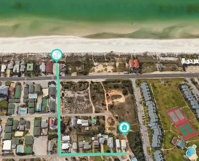 an aerial view of a city with green arrows at Sand Dollar A by Emerald Coast Retreats in Panama City Beach