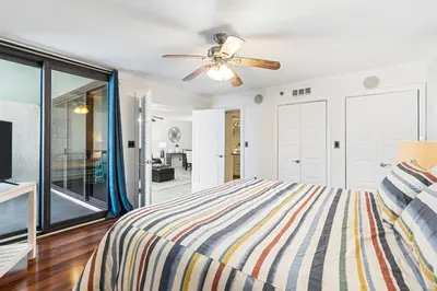 a bedroom with a bed and a ceiling fan at Watercrest 1405 - Crystal-Gulf Overlook - Sleeps 8 in Panama City Beach