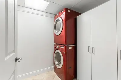 a red washer and dryer in a room at Watercrest 1405 - Crystal-Gulf Overlook - Sleeps 8 in Panama City Beach