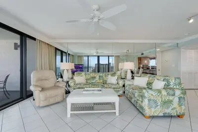 a living room with a couch and chairs and a table at Watercrest 1201 - Swell Life - Sleeps 8 2 BR 2 BA in Panama City Beach