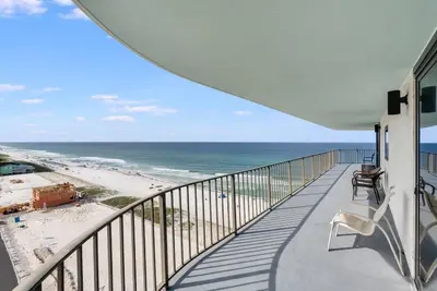 a balcony with a view of the beach at Watercrest 1201 - Swell Life - Sleeps 8 2 BR 2 BA in Panama City Beach