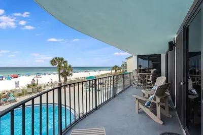 a balcony with a view of the beach at Watercrest 207 3 BR 3 BA with 2 Beachfront Masters in Panama City Beach