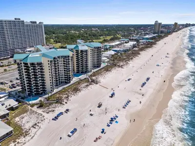 an aerial view of the beach and buildings at Sunbird 110W 1 BR 1 BA Located right next to pool in Panama City Beach