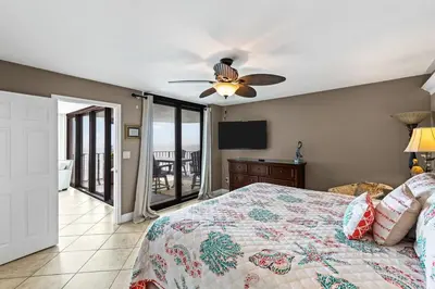 a bedroom with a bed and a ceiling fan at Gulf Peak Retreat - Watercrest 2 BR 2 BA - Sleeps in Panama City Beach