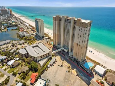 an aerial view of a beach with tall buildings and the ocean at Tidewater 2411 - Tidewater Retreat - Sleeps 8 in Panama City Beach